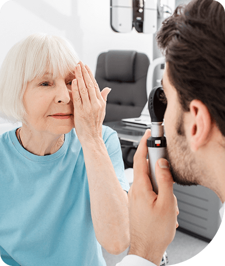 Doctor checking up old woman